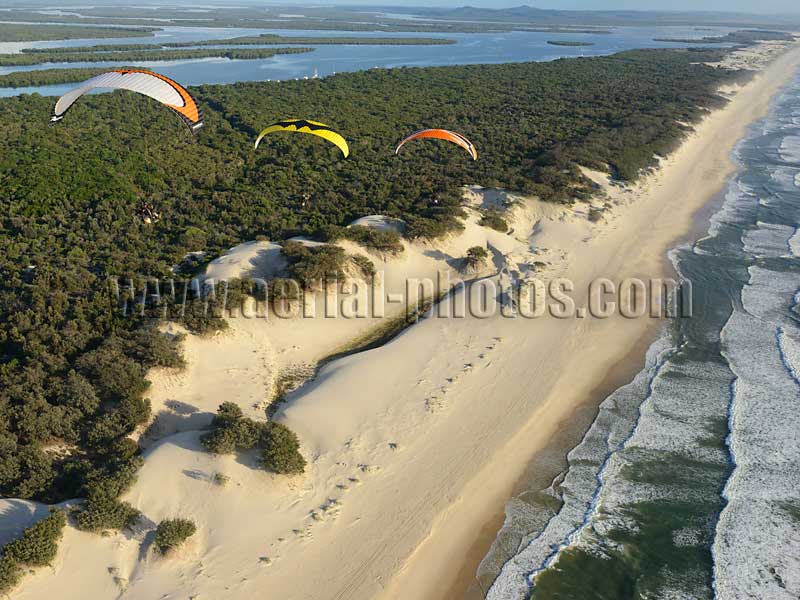 AERIAL VIEW photo of paramotoring over South Stradbroke Island, Gold Coast, Queensland, Australia.