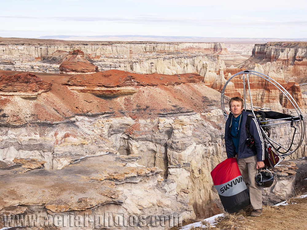 The photographer with his amazing portable aircraft on the rim of Coal Mine Canyon. Navajo & Hopi Reservations boundary, Arizona, USA.