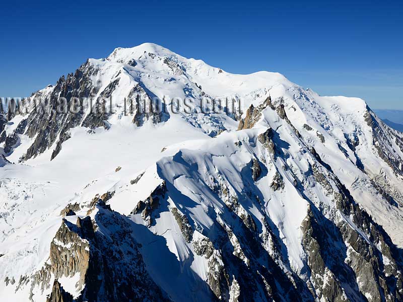 AERIAL VIEW photo of Mont-Blanc and Aiguille du Midi, Haute-Savoie, Auvergne-Rhône-Alpes, France. VUE AERIENNE.