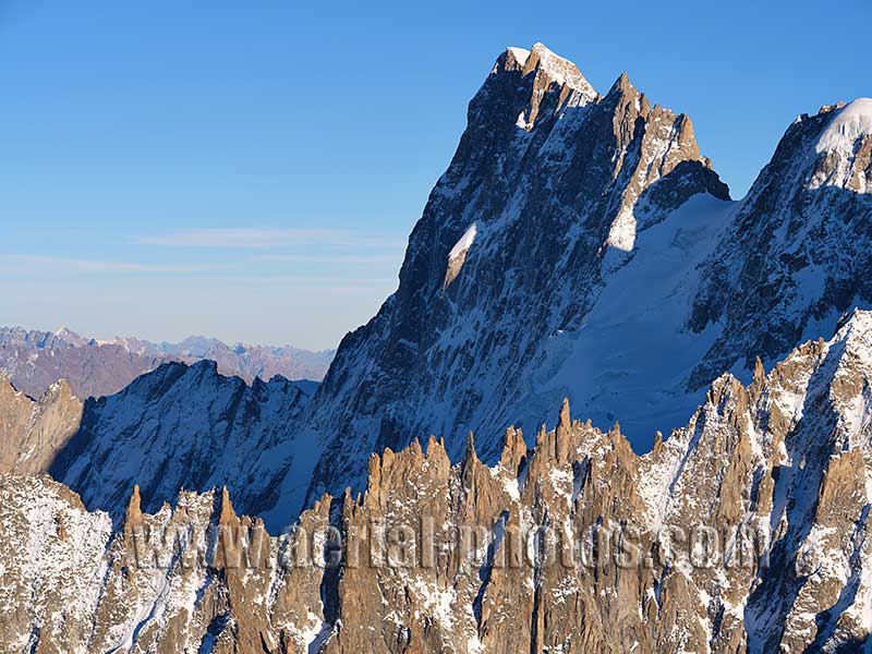 Aerial view. Photo of Les Périades Needles and Grandes Jorasses, Chamonix-Mont-Blanc, Haute-Savoie, Auvergne-Rhône-Alpes, France. Vue aérienne, Aiguilles Les Périades.