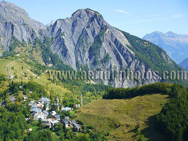 Aerial view. Photo of Ornon, a hamlet in Isère, Auvergne-Rhône-Alpes, France. Vue aérienne Aiguilles de Plan, Blaitière et Grépon, Aiguilles de Chamonix.