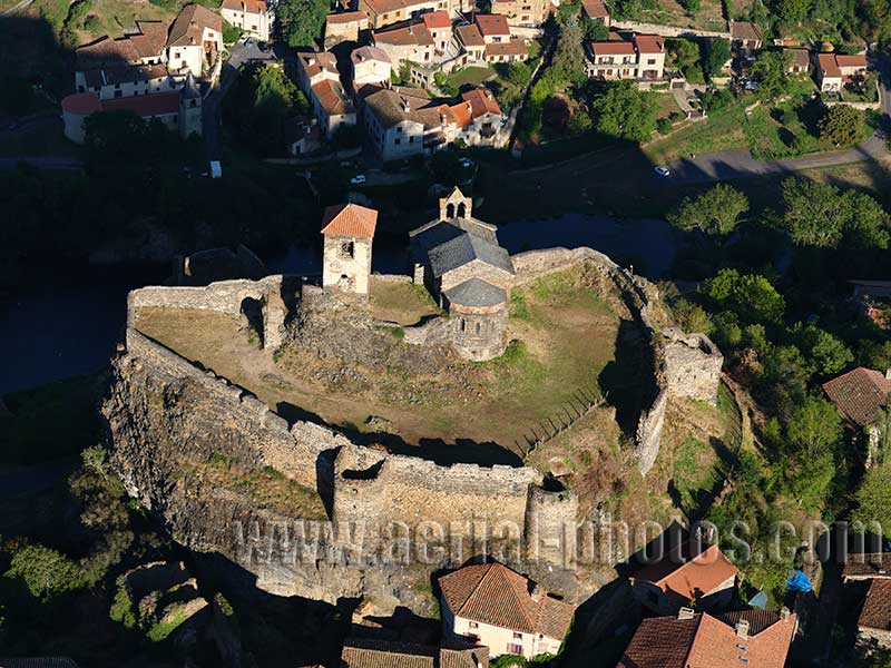 Aerial view. Photo of a castle overlooking the Allier River, Haute-Loire, Auvergne-Rhône-Alpes, France. Vue aérienne.