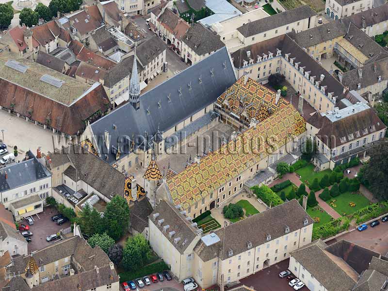 AERIAL VIEW photo of the Hospices of Beaune, Cote d'Or, Burgundy, France. VUE AERIENNE, Hotel-Dieu de Beaune, Bourgogne-Franche-Comté.