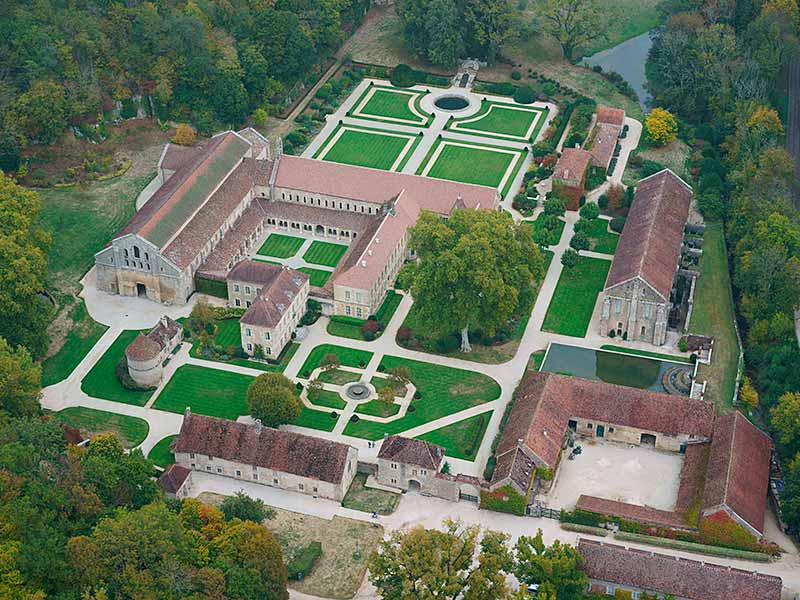 AERIAL VIEW photo of Fontenay Abbey, Cote d'Or, Burgundy, France. VUE AERIENNE, Abbaye de Fontenay, Bourgogne-Franche-Comté.