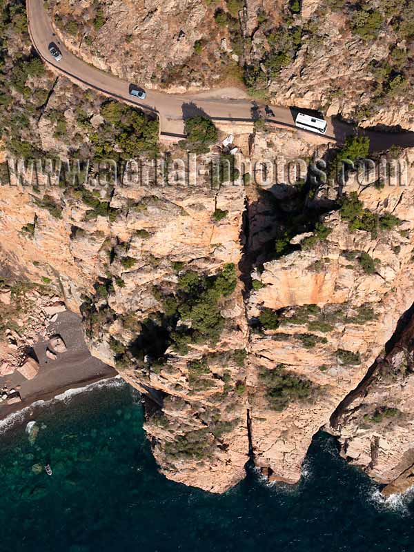 AERIAL VIEW photo of a vertiginous road, Porto, Corsica, France. VUE AERIENNE d'une route vertigineuse, Corse.