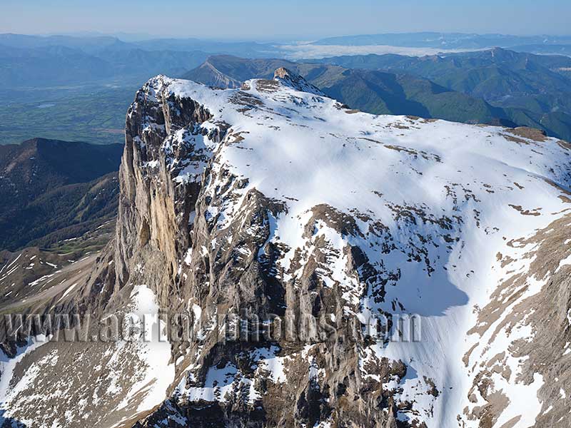 Aerial view of Bure Peak and its massive cliff, Dévoluy Massif, France. Vue aérienne.