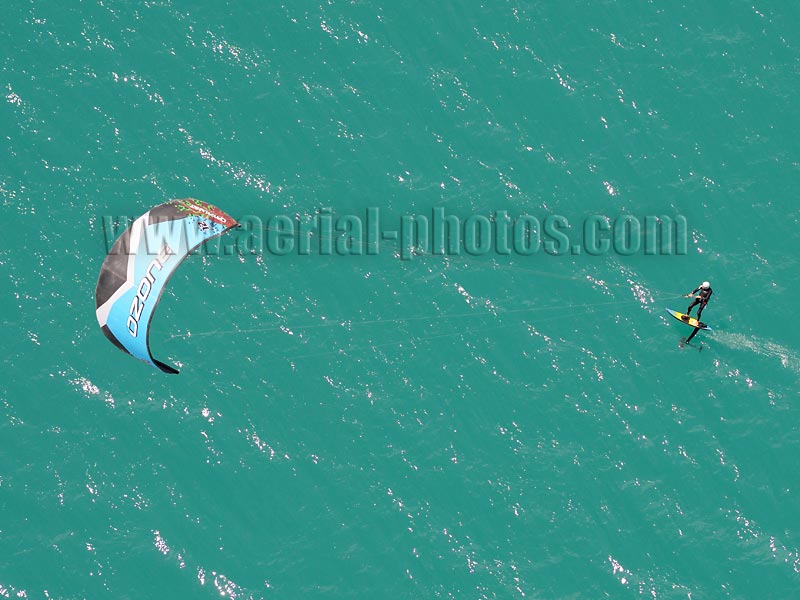 Aerial view of a kitesurfer on Lake Serre-Ponçon in the Durance Valley, France. Vue aérienne.