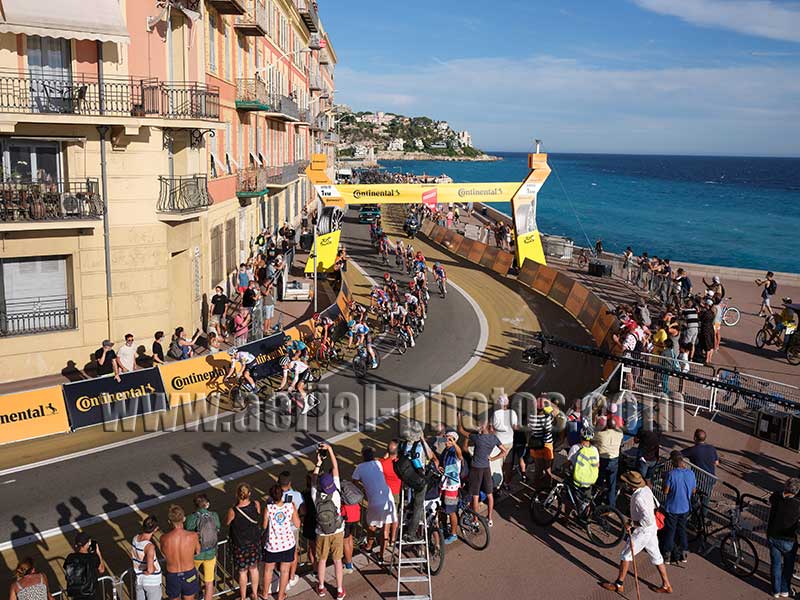 Aerial view of the Tour de France bicycle race on the famous Promenade des Anglais in Nice Côte d'Azur, France. Vue aérienne.