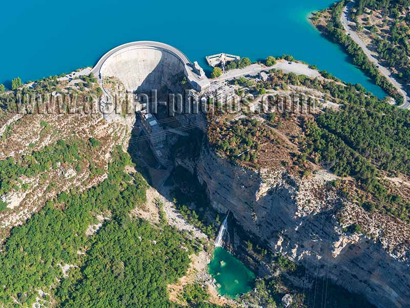 Aerial view of Castillon Dam between the Verdon River and Lake Castillon in the Alps, France. Vue aérienne.