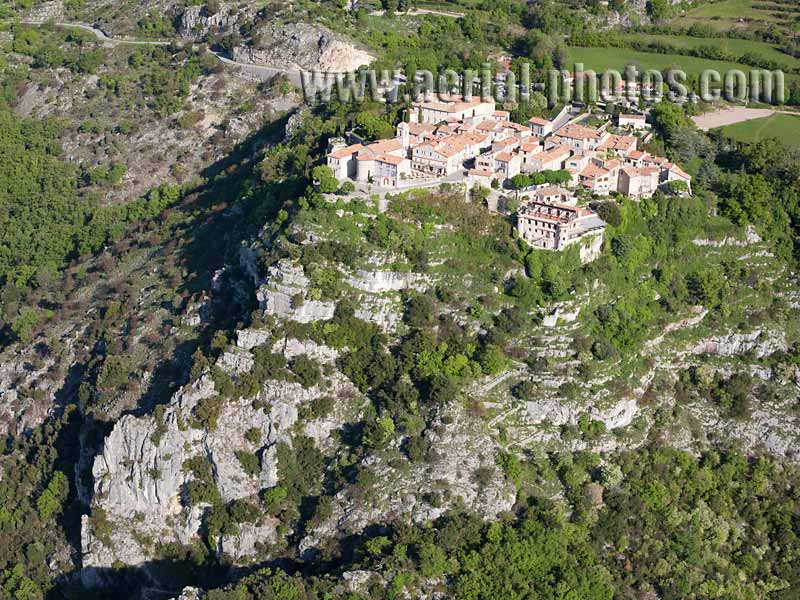 AERIAL VIEW photo of an hilltop town, Gourdon, French Riviera, France. VUE AERIENNE village médiéval perché, Côte d'Azur.