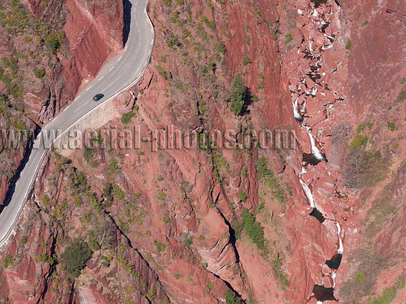 AERIAL VIEW photo of a road and waterfall, Gorges du Cians, French Alps, France. VUE AERIENNE Alpes-Maritimes, Alpes Françaises.