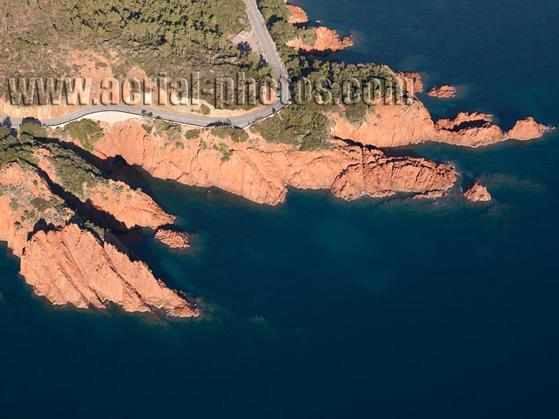 Aerial view of a winding road on the coast of the Estérel Massif on the French Riviera, France. Vue aérienne, Côte d'Azur.