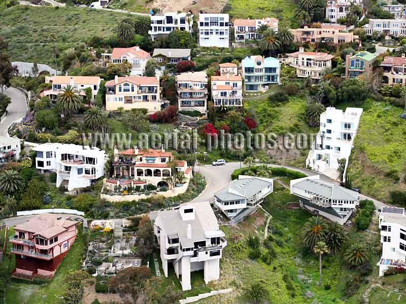 Aerial view of dream houses on a steep slope, Malibu, Los Angeles, California, USA.